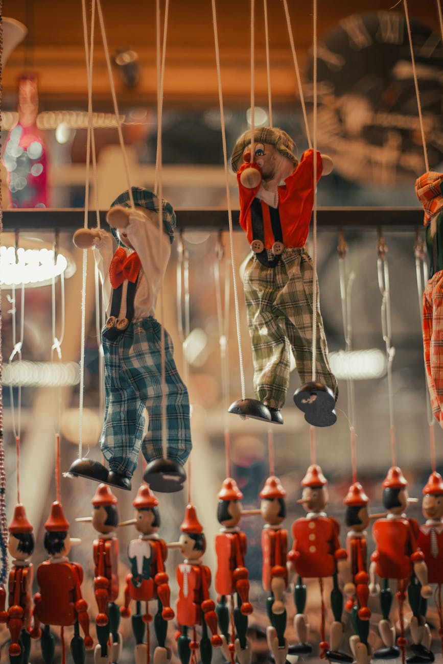 assorted puppets on display