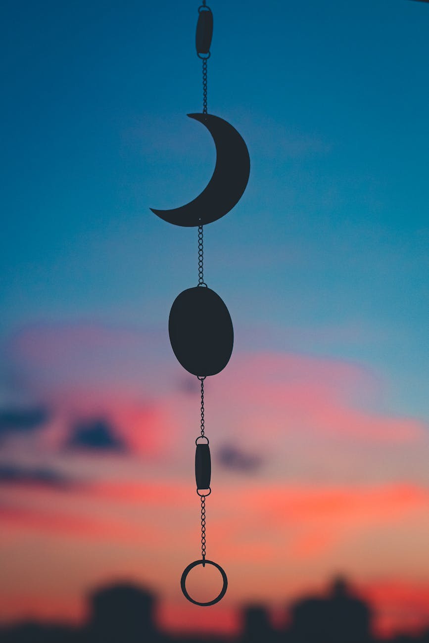 dramatic sky behind a wind chime